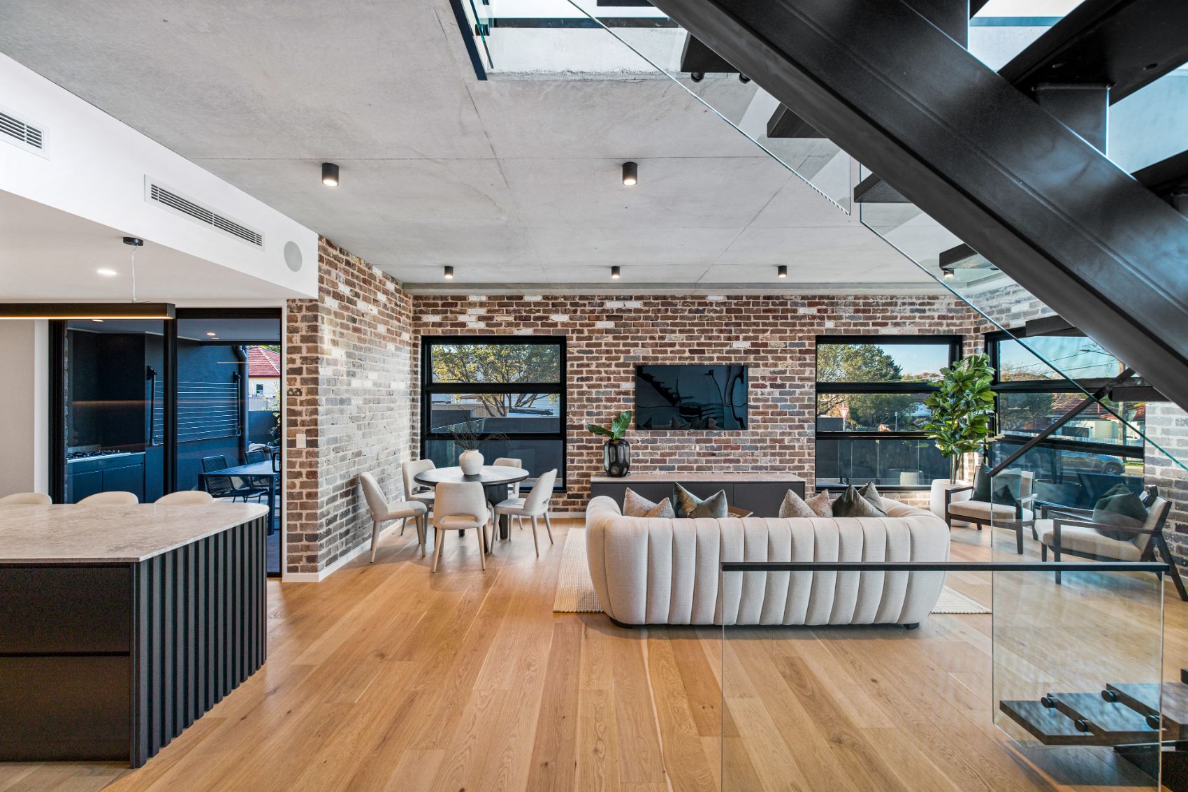 Open-plan living with exposed brick