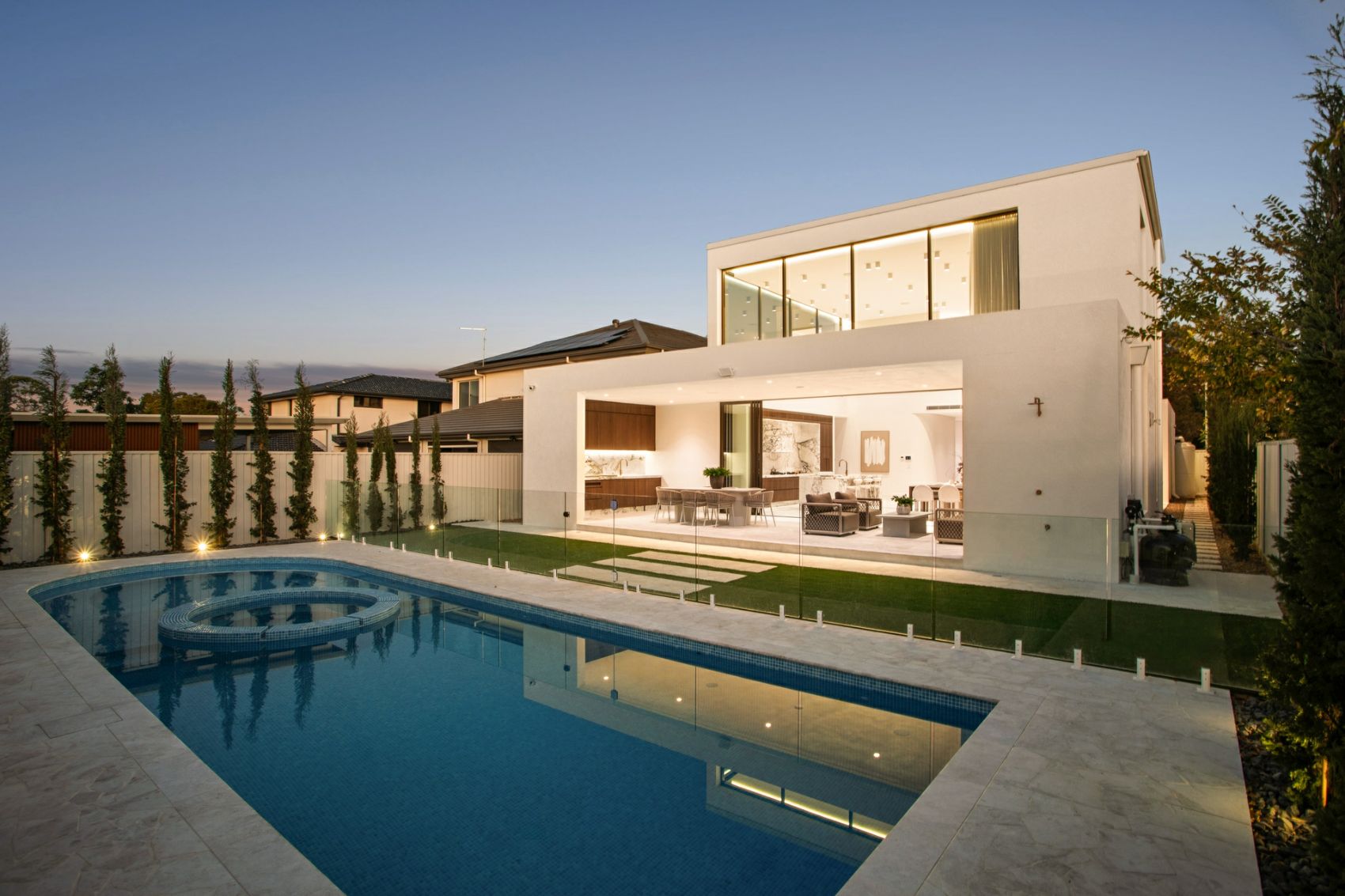 Strathfield residence, pool and rear elevation at dusk