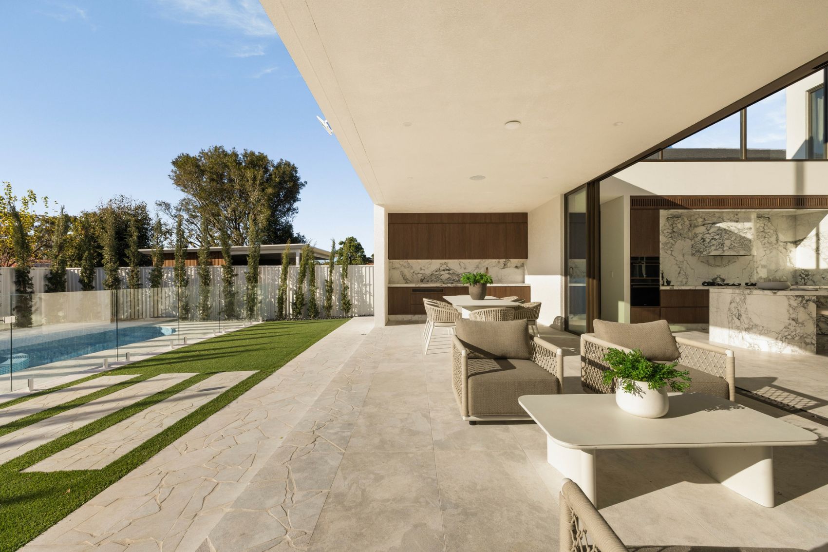 Covered alfresco terrace and outdoor kitchen